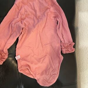 Ruffle Butts Dusty Pink Baby Onesie